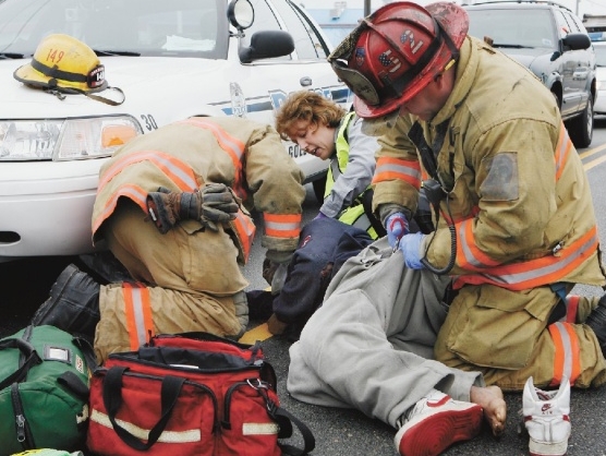 Picture of a car accident victim with healthcare worker