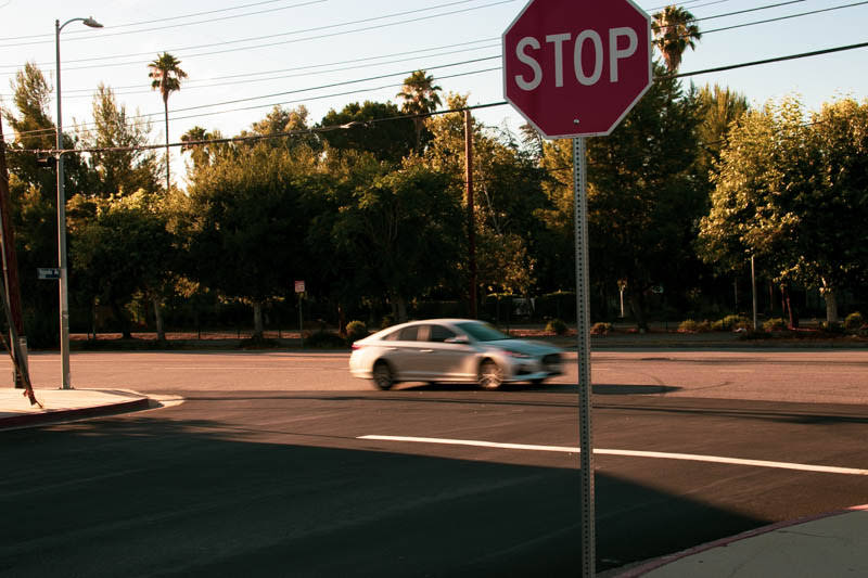 Picture of a road and a stop sign